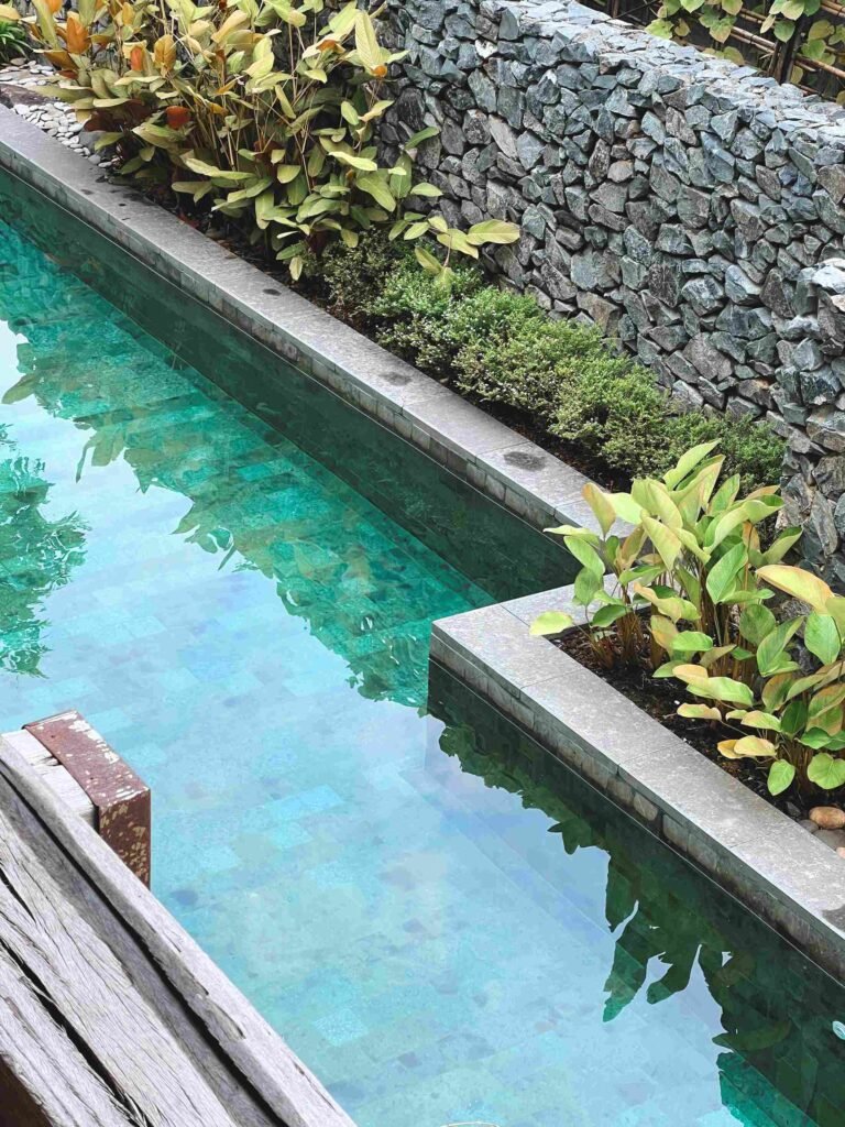 Stone Landscaping Around Pool Dubai | Kabeer Saeed Akram Landscape & Gardening LLC